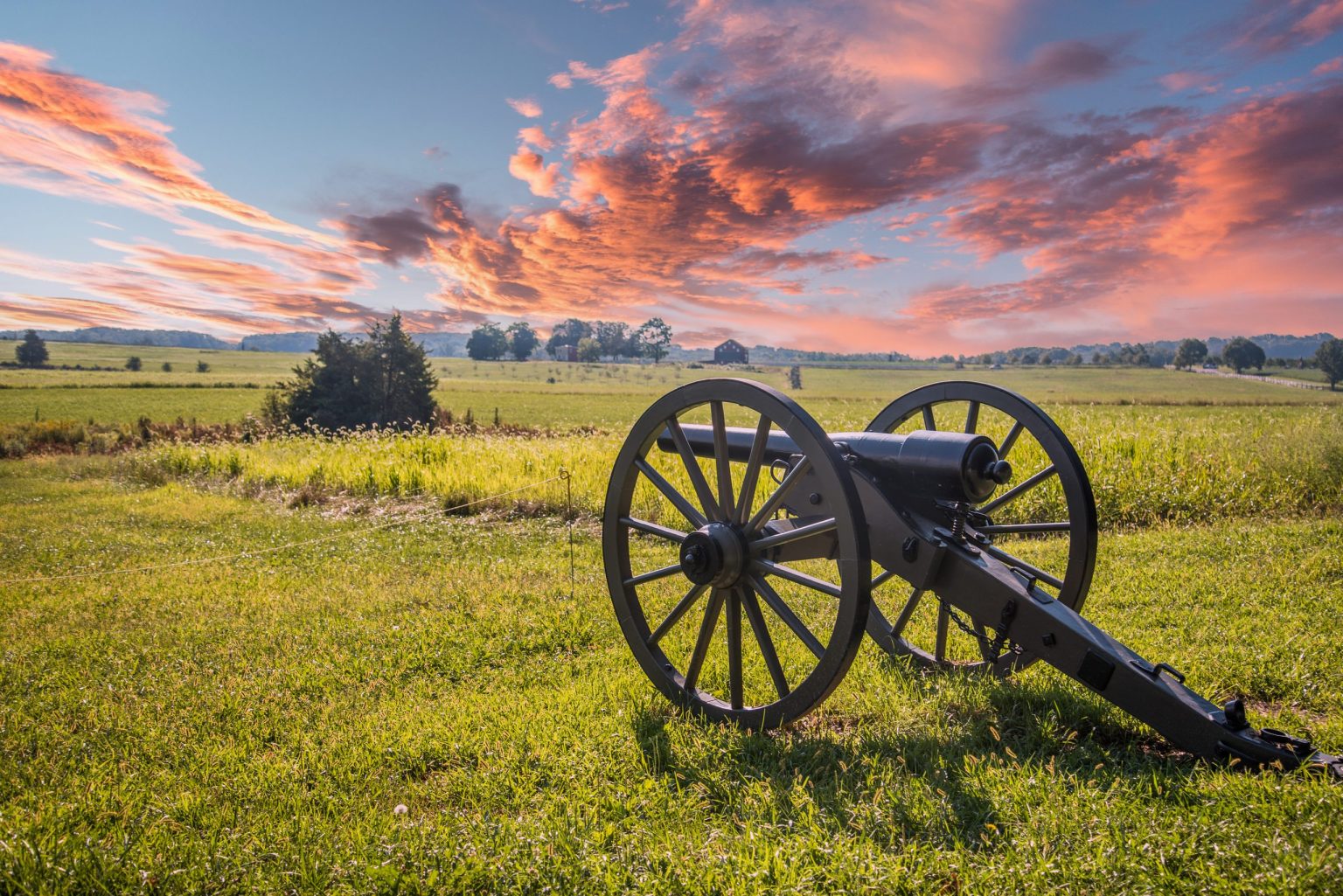 Civil War cannon on Gettysburg battlefield at sunset, Pennsylvania