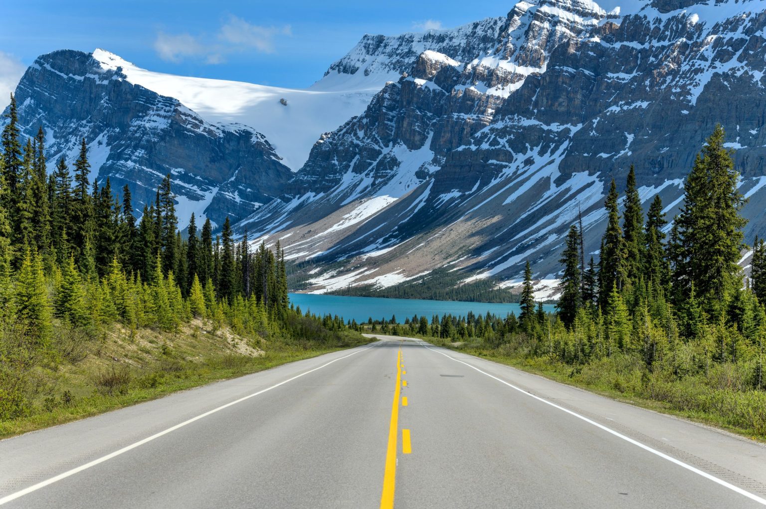Icefields Parkway road beneath glaciated peaks, Canadian Rockies