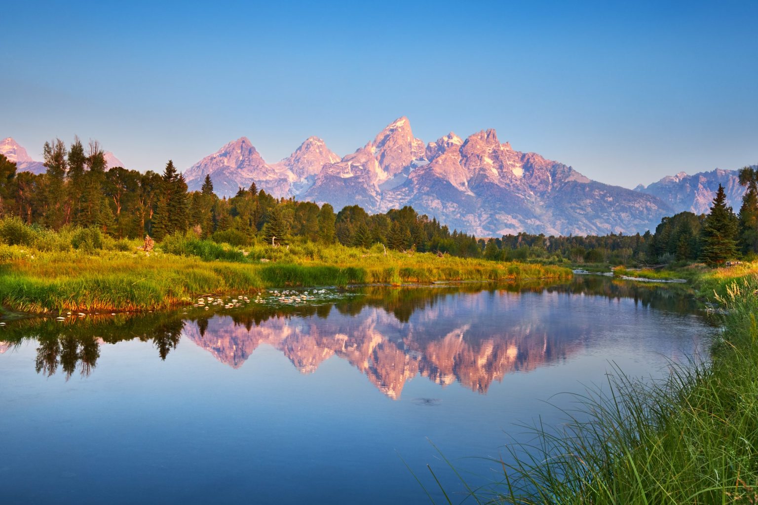 The Teton Range reflected at Schwabacher's Landing on the Snake River