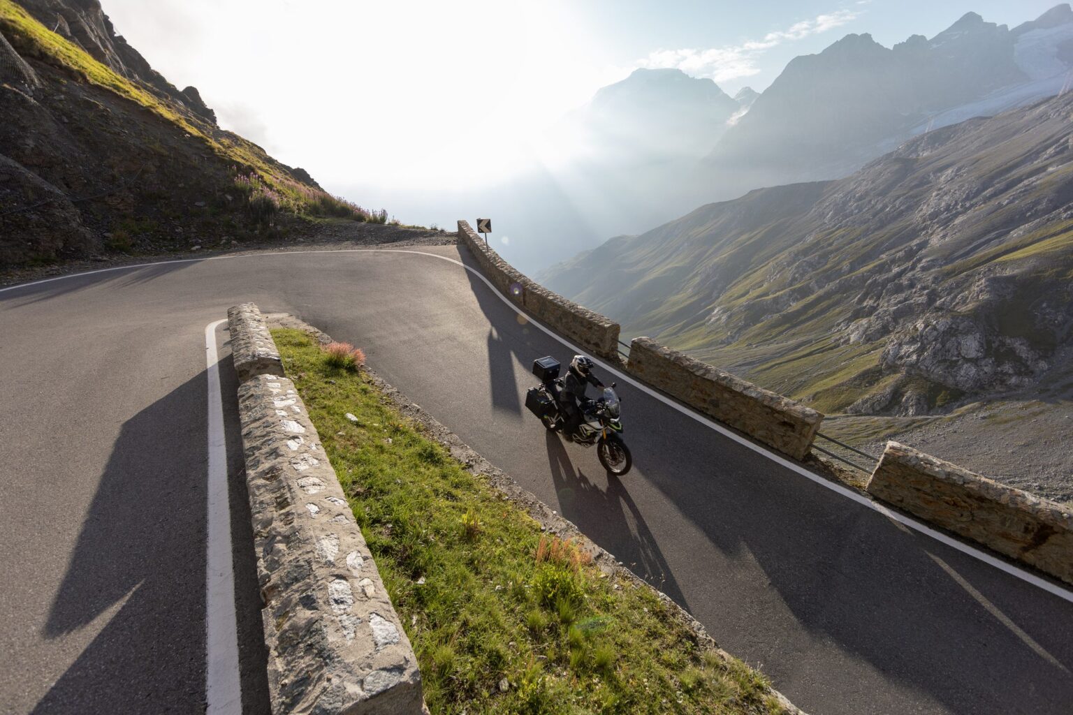 Stelvio pass motorcycle hairpin italian alps tour