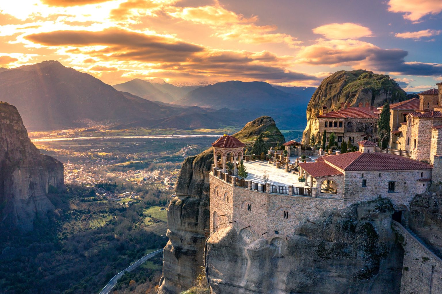 Clifftop monastery at Meteora at sunset, Greece