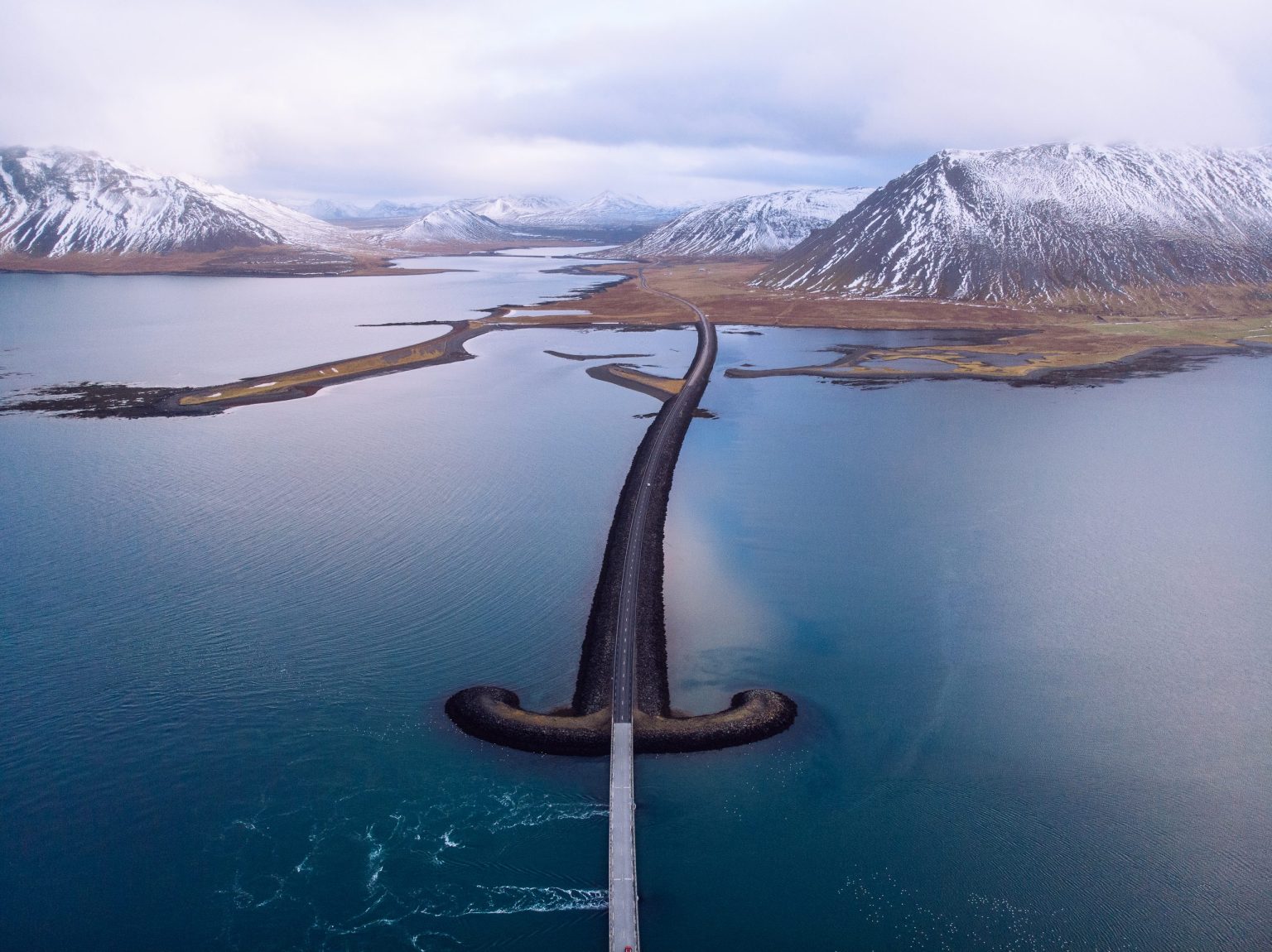 Aerial view of a causeway road across a fjord on Snæfellsnes, Iceland