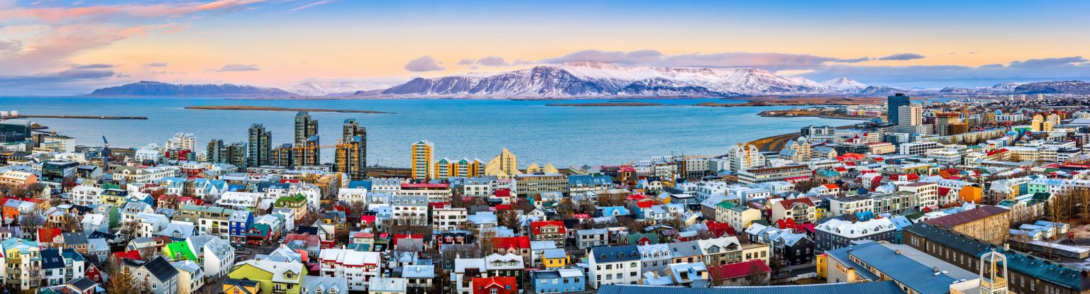 Colourful rooftops of Reykjavík with Mount Esja beyond