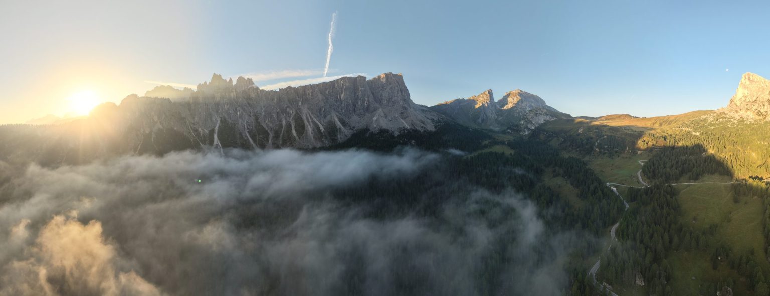 Dolomite peaks above a cloud inversion at sunrise