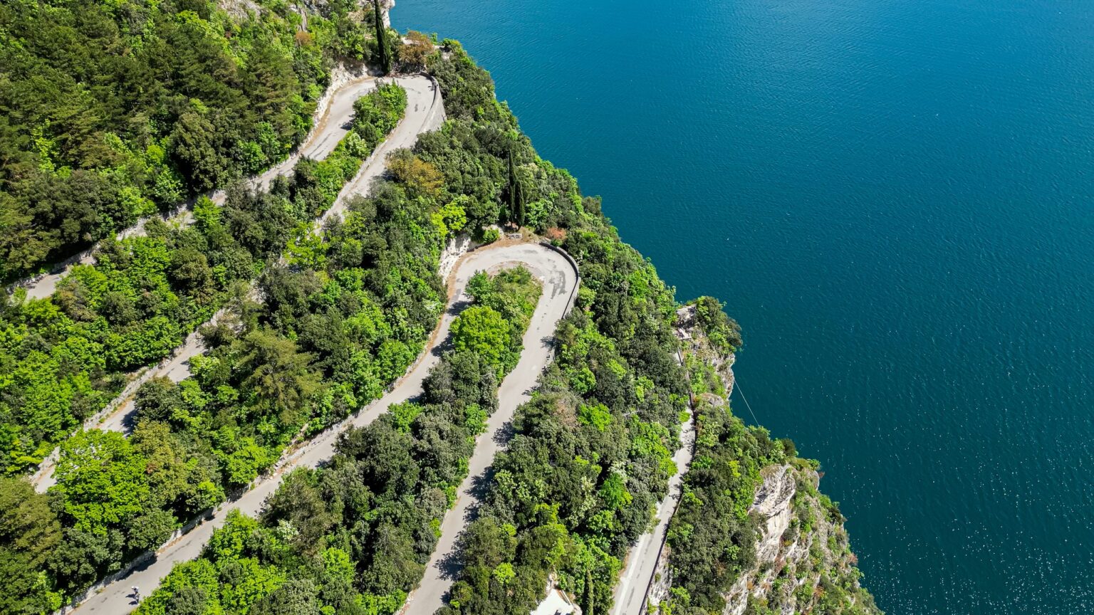 Lake garda cliff road hairpins aerial drive