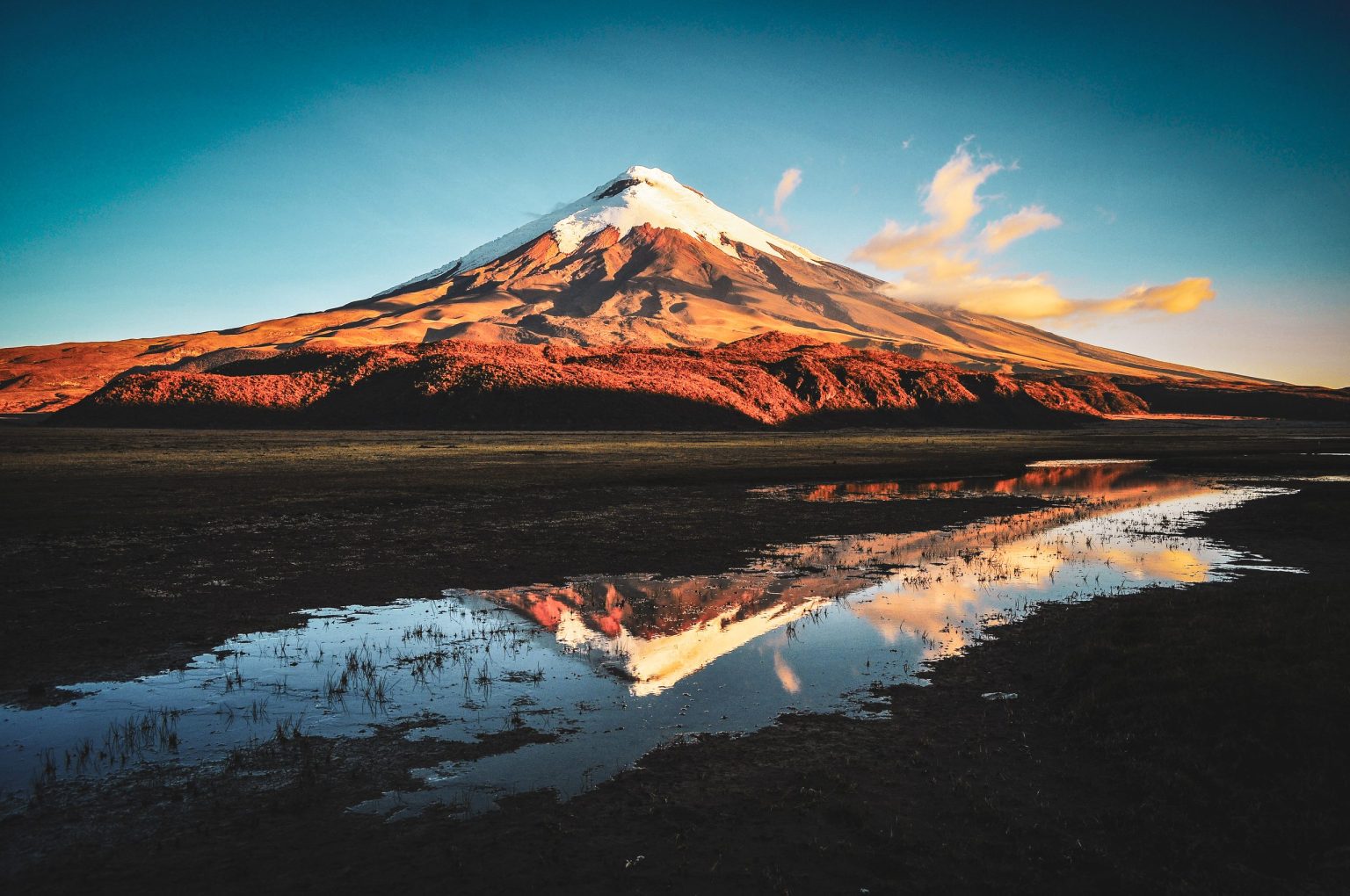 Osorno Volcano reflected in a lake at sunset, Los Lagos, Chile