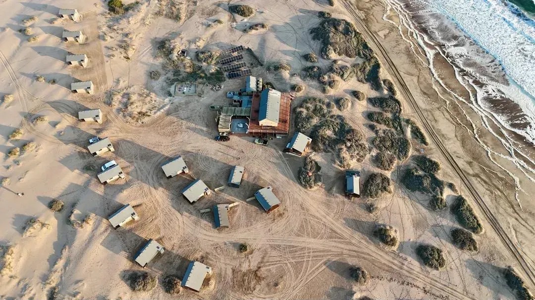 Aerial view of the beach camp at Meob Bay on the Namib coast
