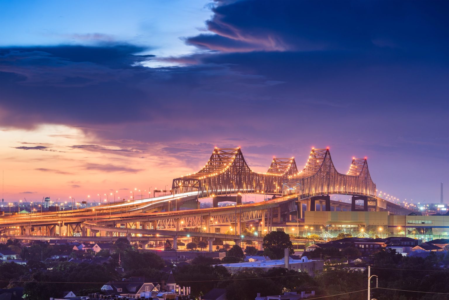 New Orleans and the Crescent City Connection bridge at dusk