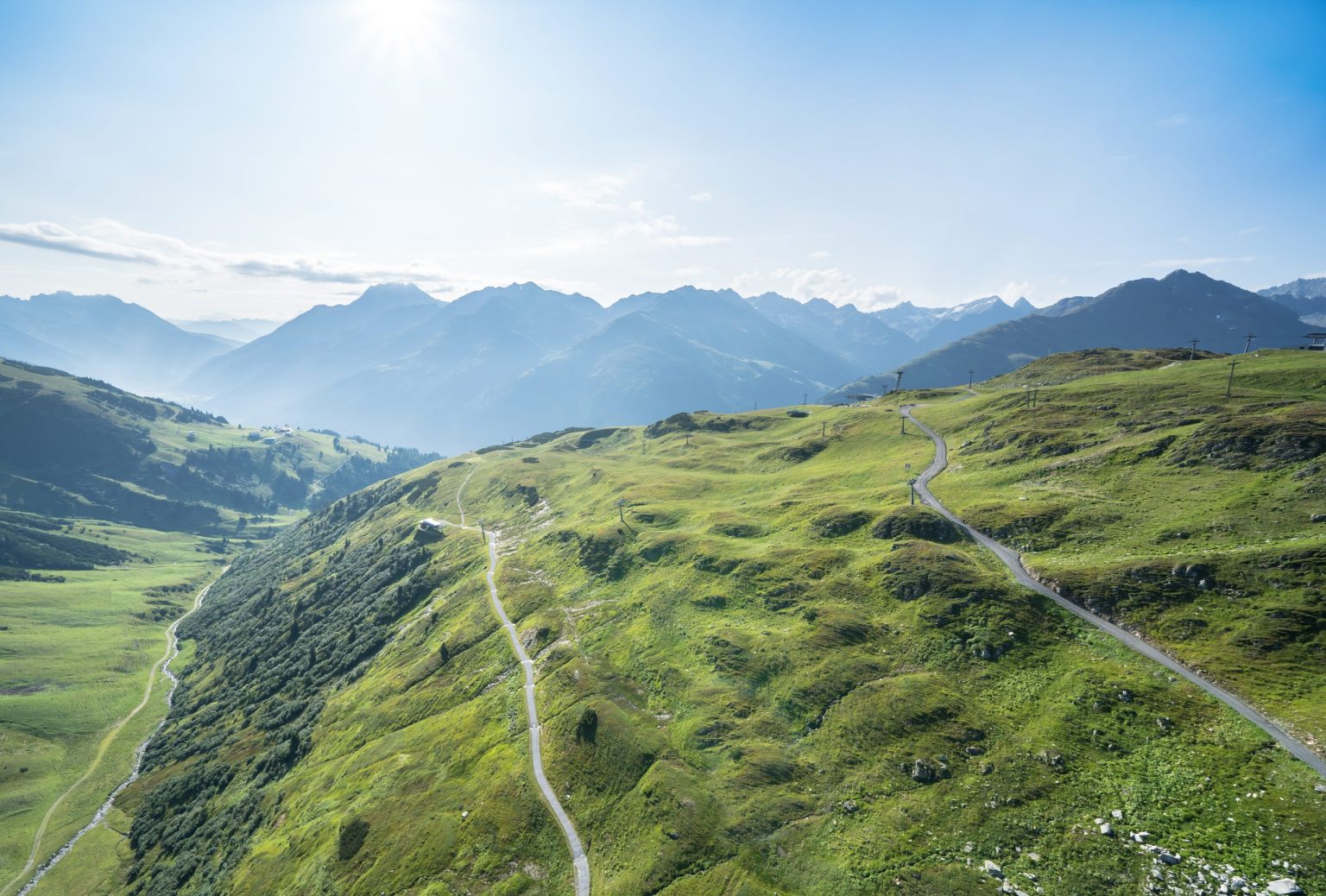Mountain road along an alpine ridge in summer, Austria