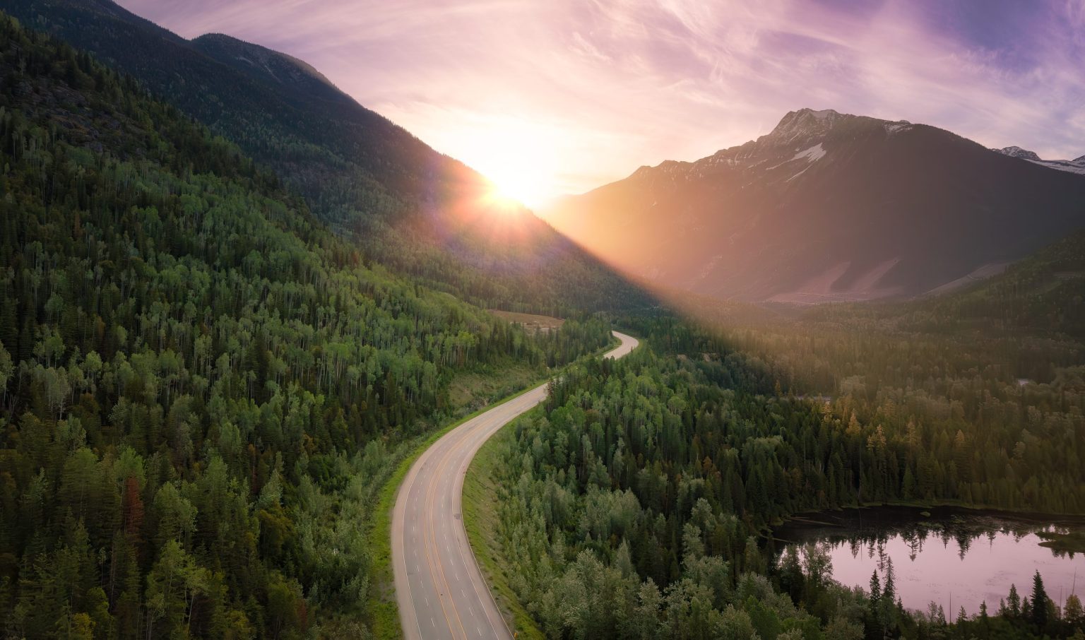 Road through a mountain valley near Revelstoke