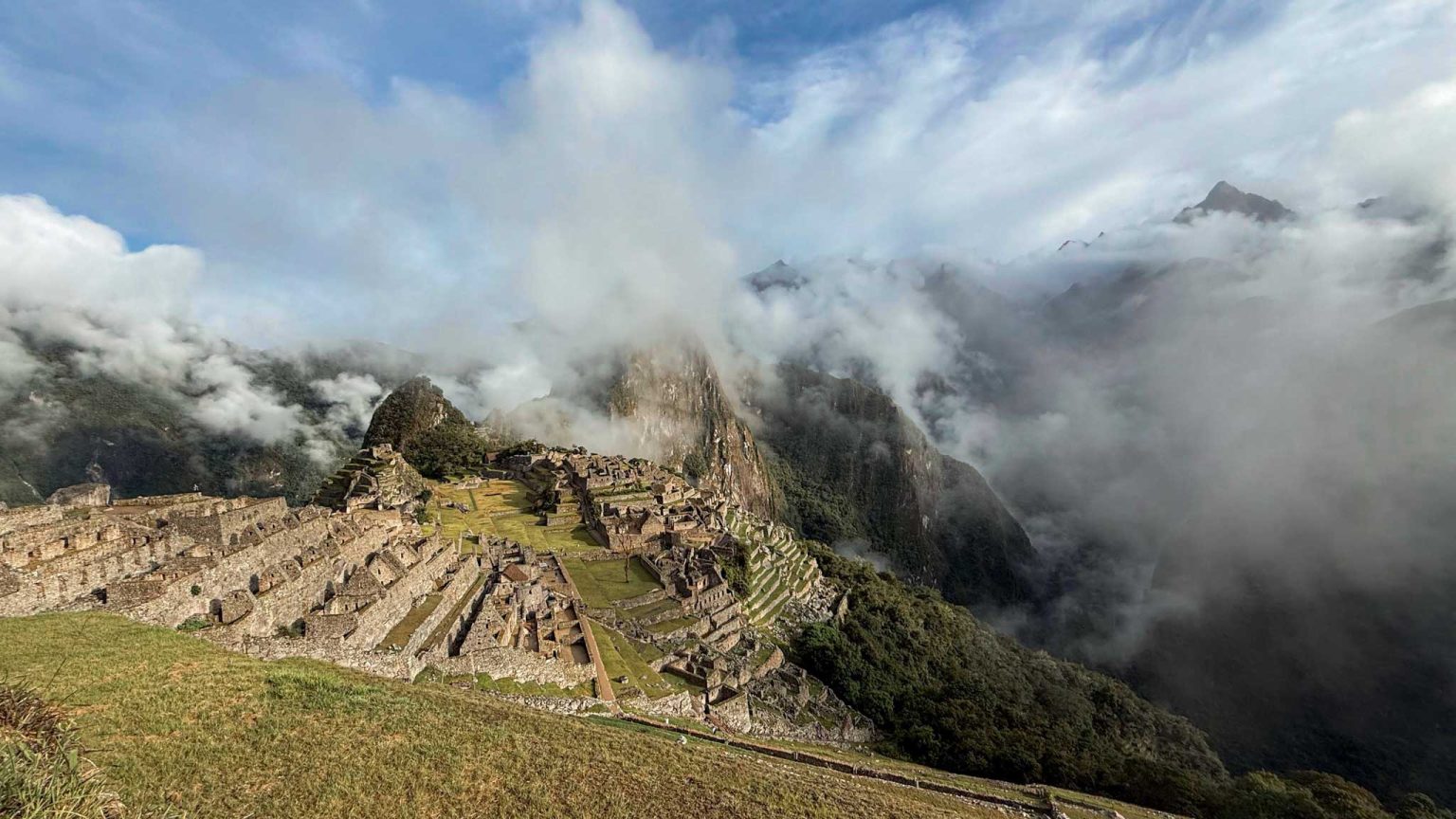 Machu Picchu emerging from the clouds, Peru