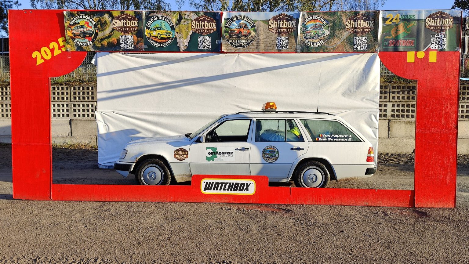 Old Mercedes estate rally car in a giant Matchbox box photo frame