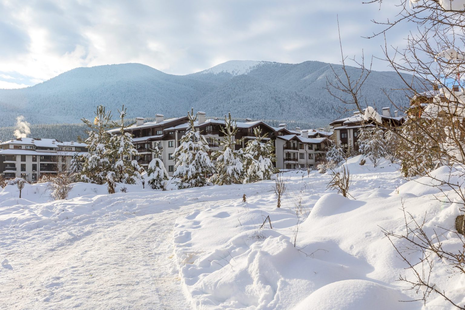 Snow-covered chalets and hotels at a Bulgarian ski resort